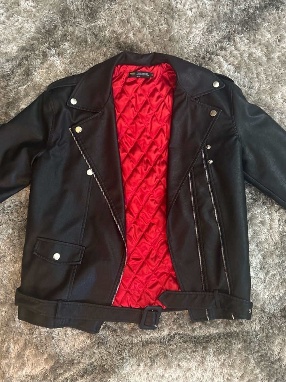 Finesse Black Faux Leather Jacket with Red Quilted Lining
